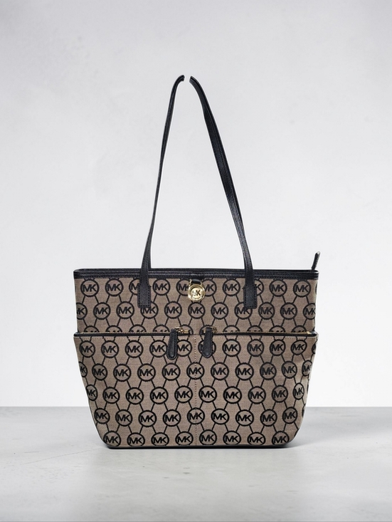 Michael Kors Handbags - Michael Kors Jet Set Travel Brown MK Signature Tote Black Trim Gold Medallion